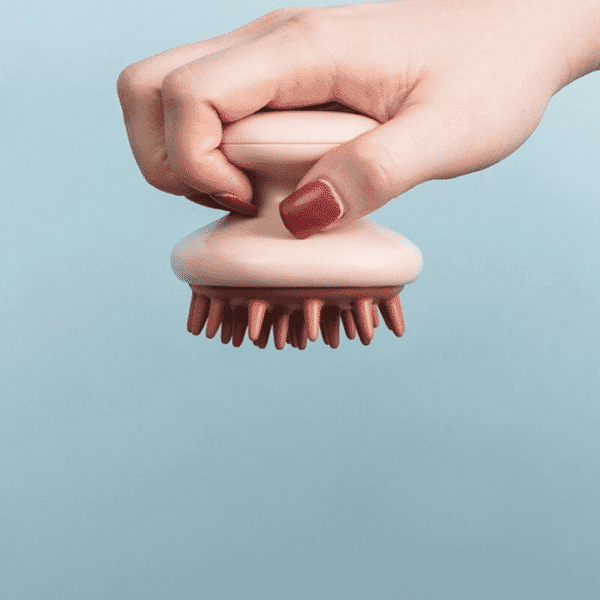 Brosse massante cuir chevelu